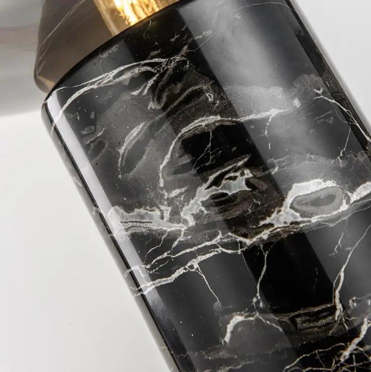 Gold marble table lamp with soft white glass shade close detailed