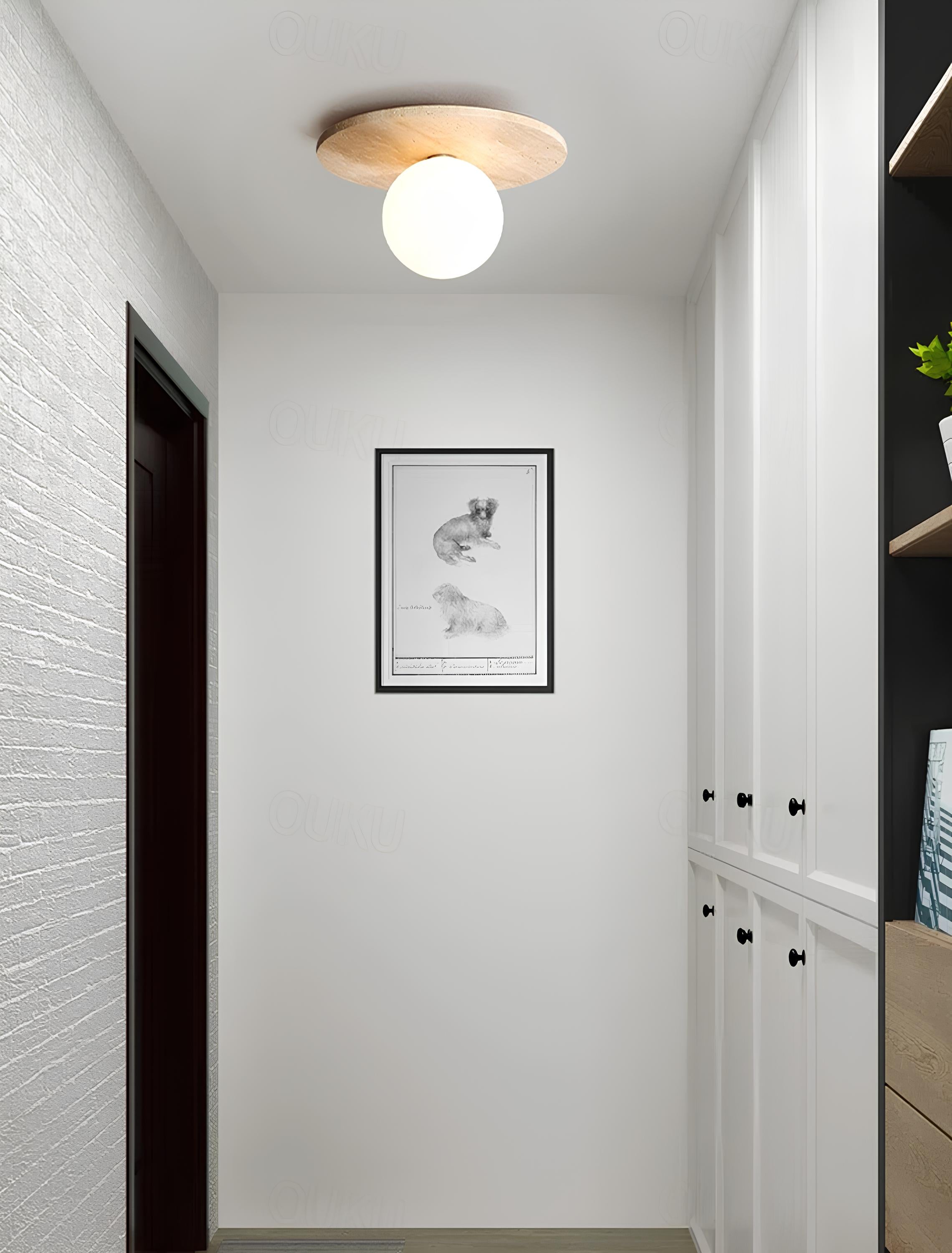 White round stone ceiling lamp with sculptural form and daylight glow