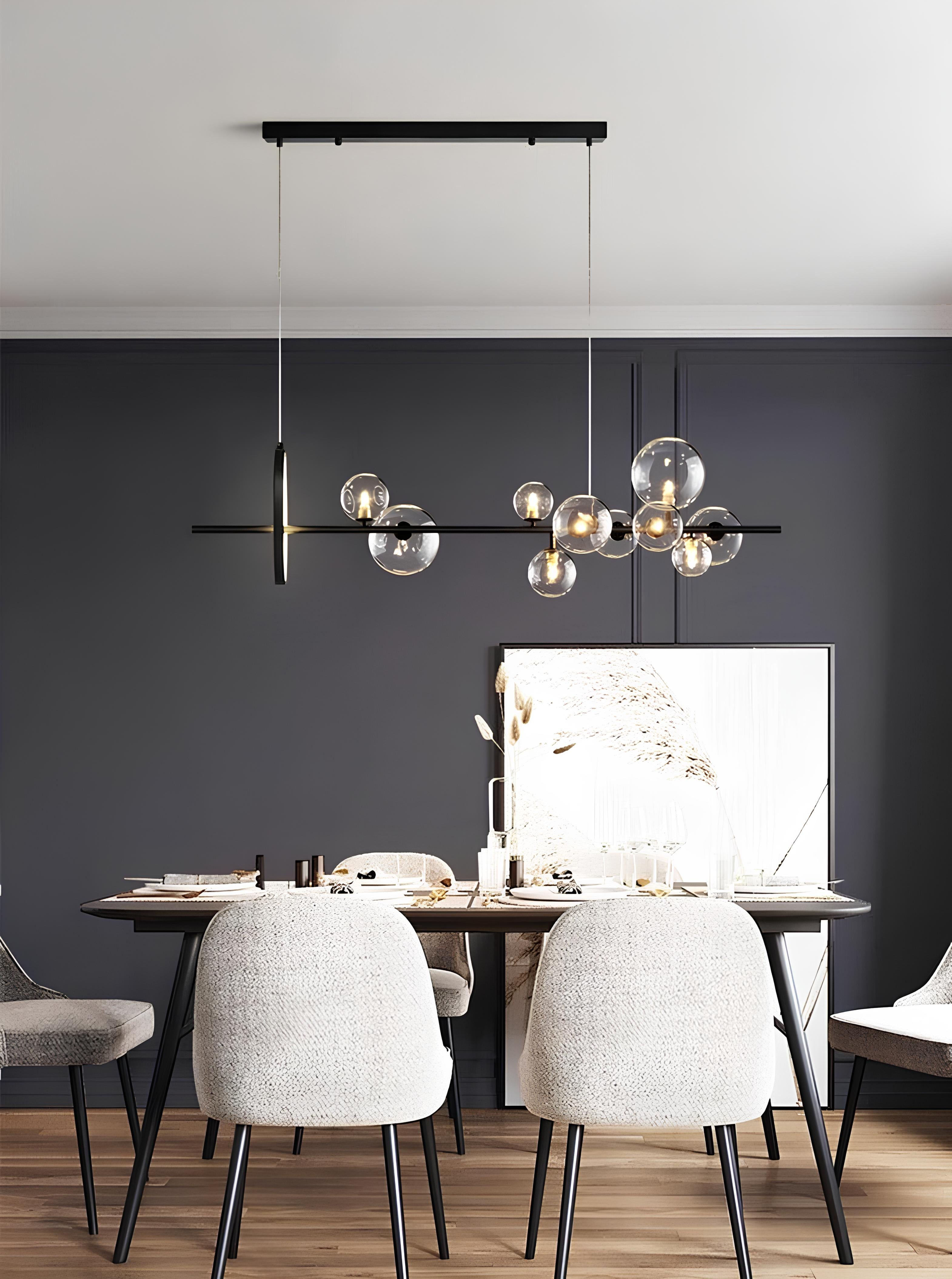 Minimal chandelier with warm white glow and sculptural glass bubbles