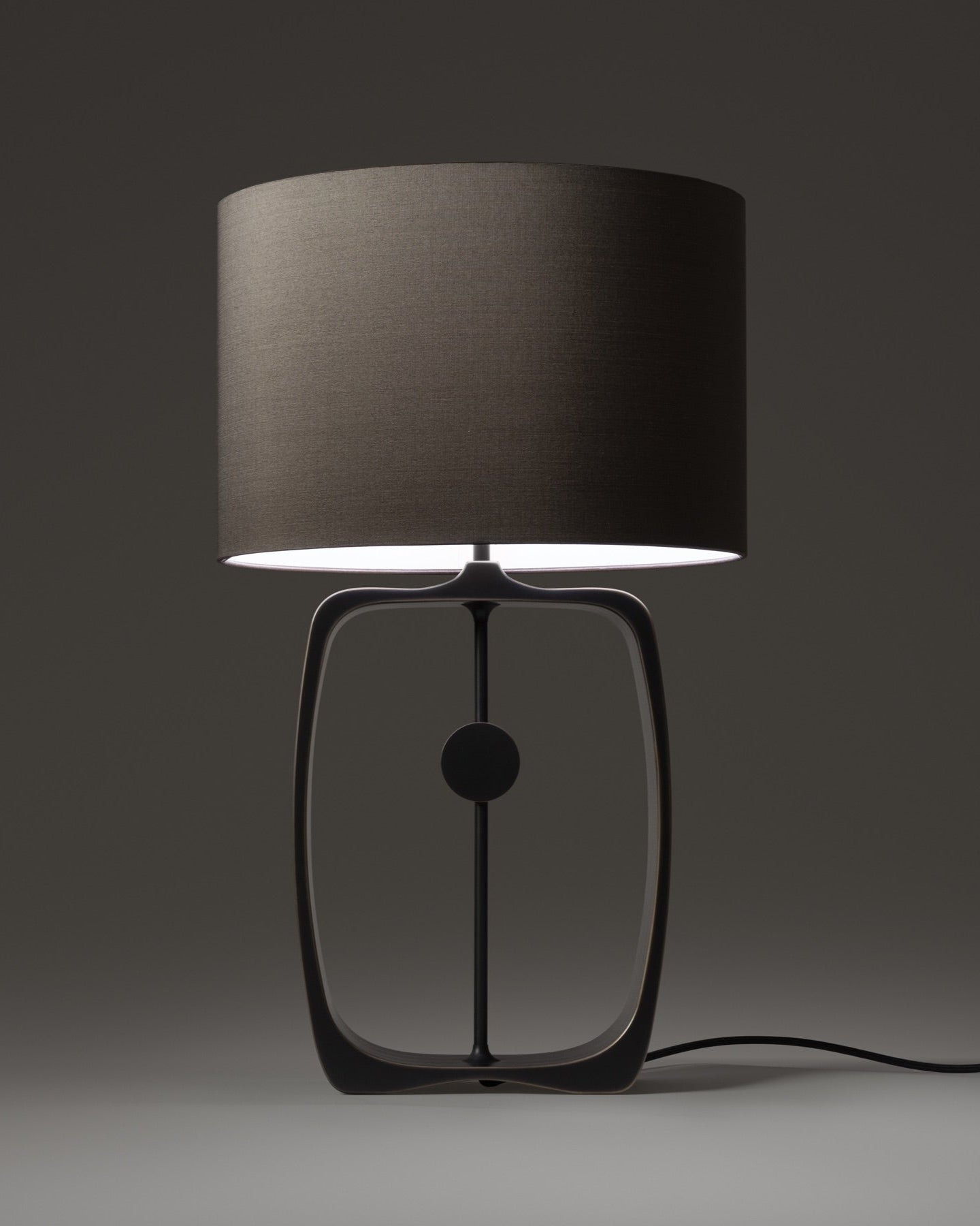 Black Nordic-style table lamp with tall fabric shade