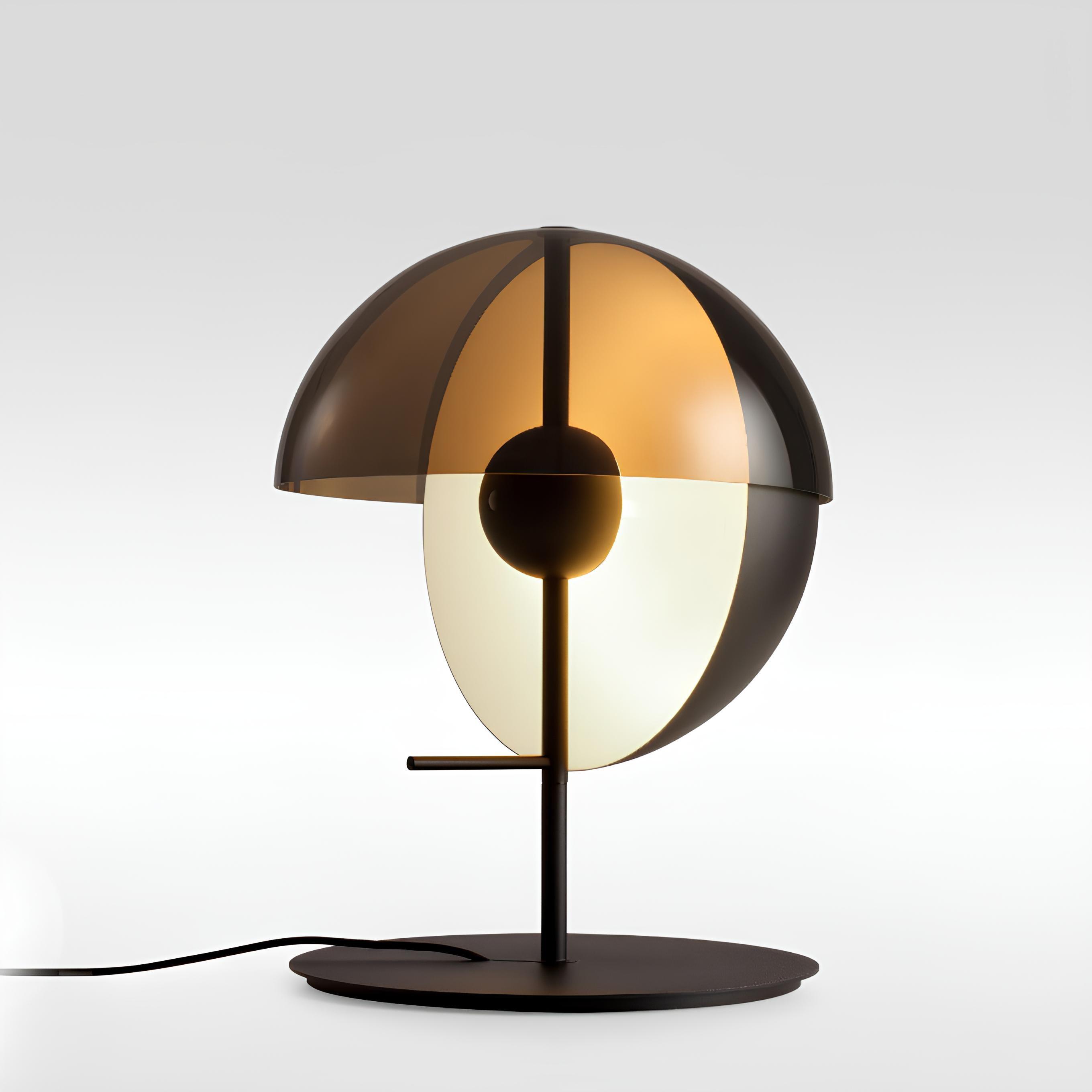 Minimal table lamp on desk or bedside with sculptural base1