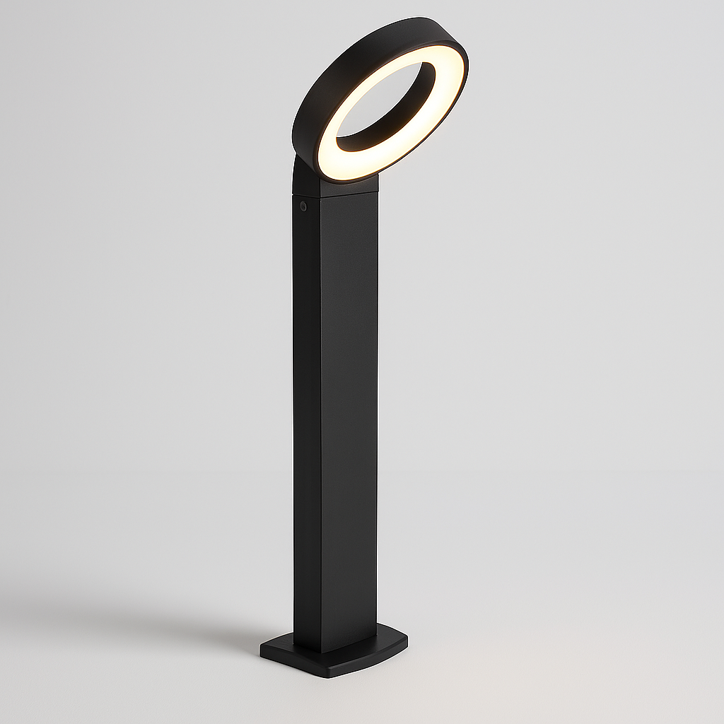 Forma Bollard Path Light standing in a landscaped garden