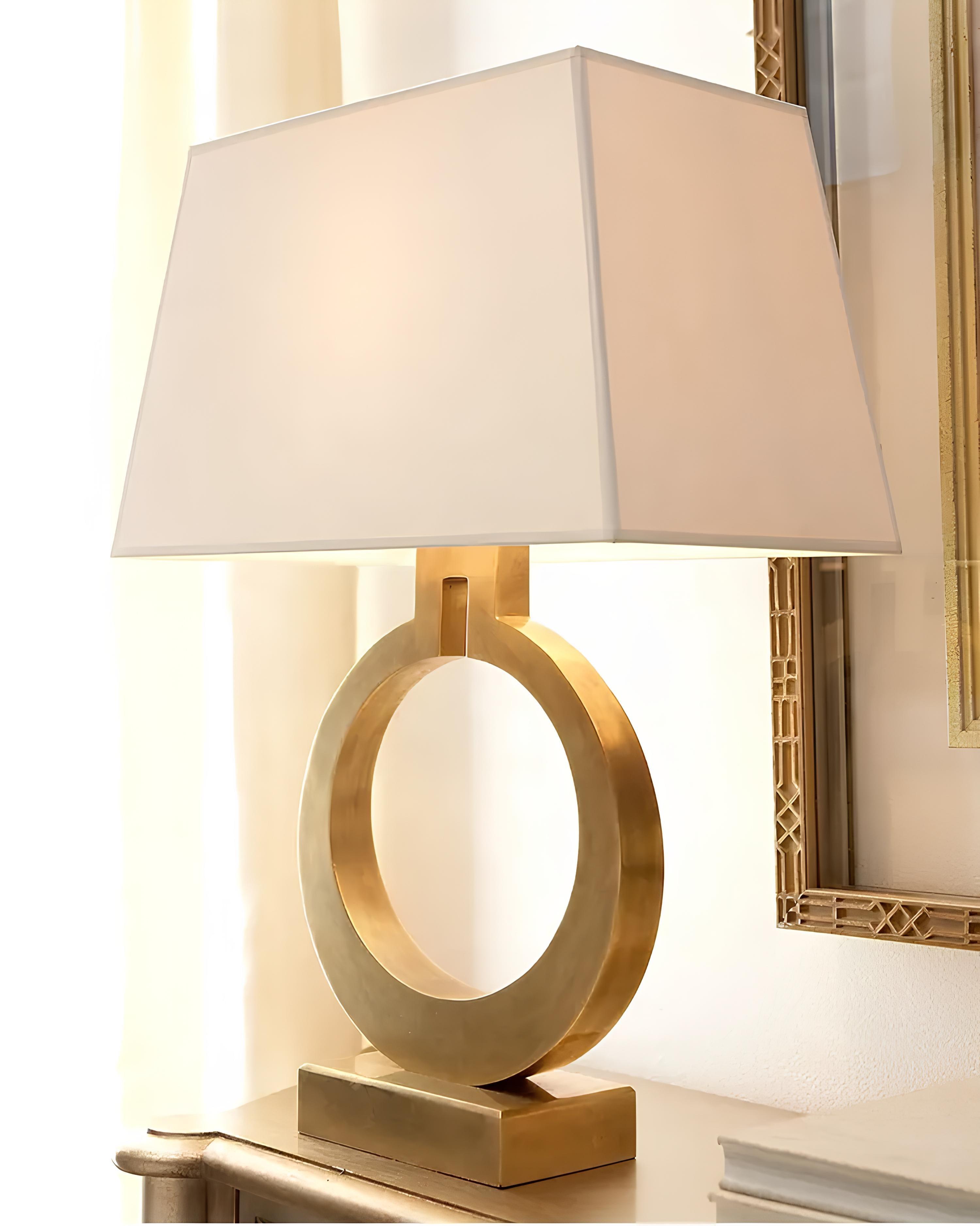 Modern table lamp with fabric shade and gold metal base