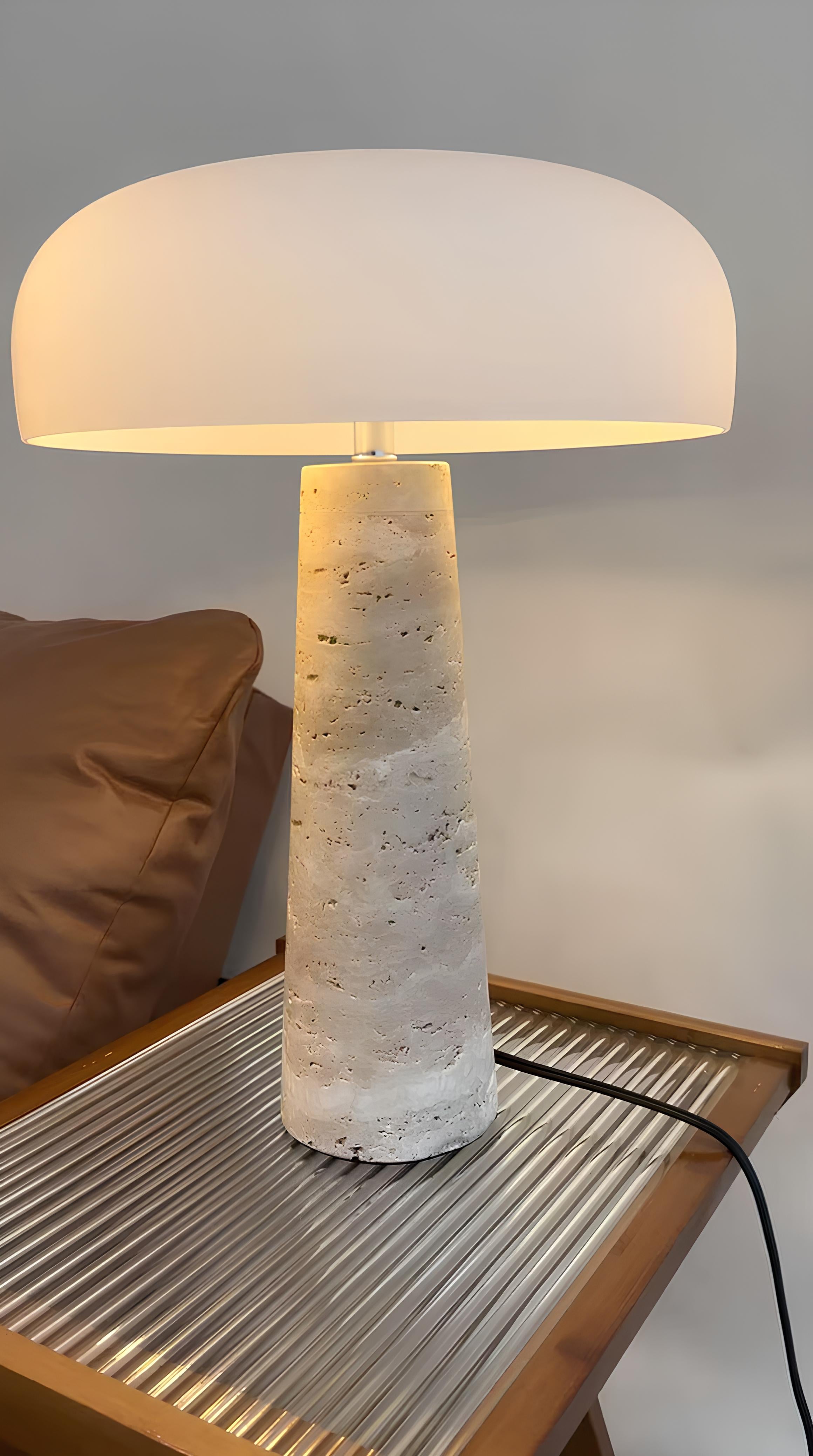 Designer lamp with sandy glass shade in modern living room