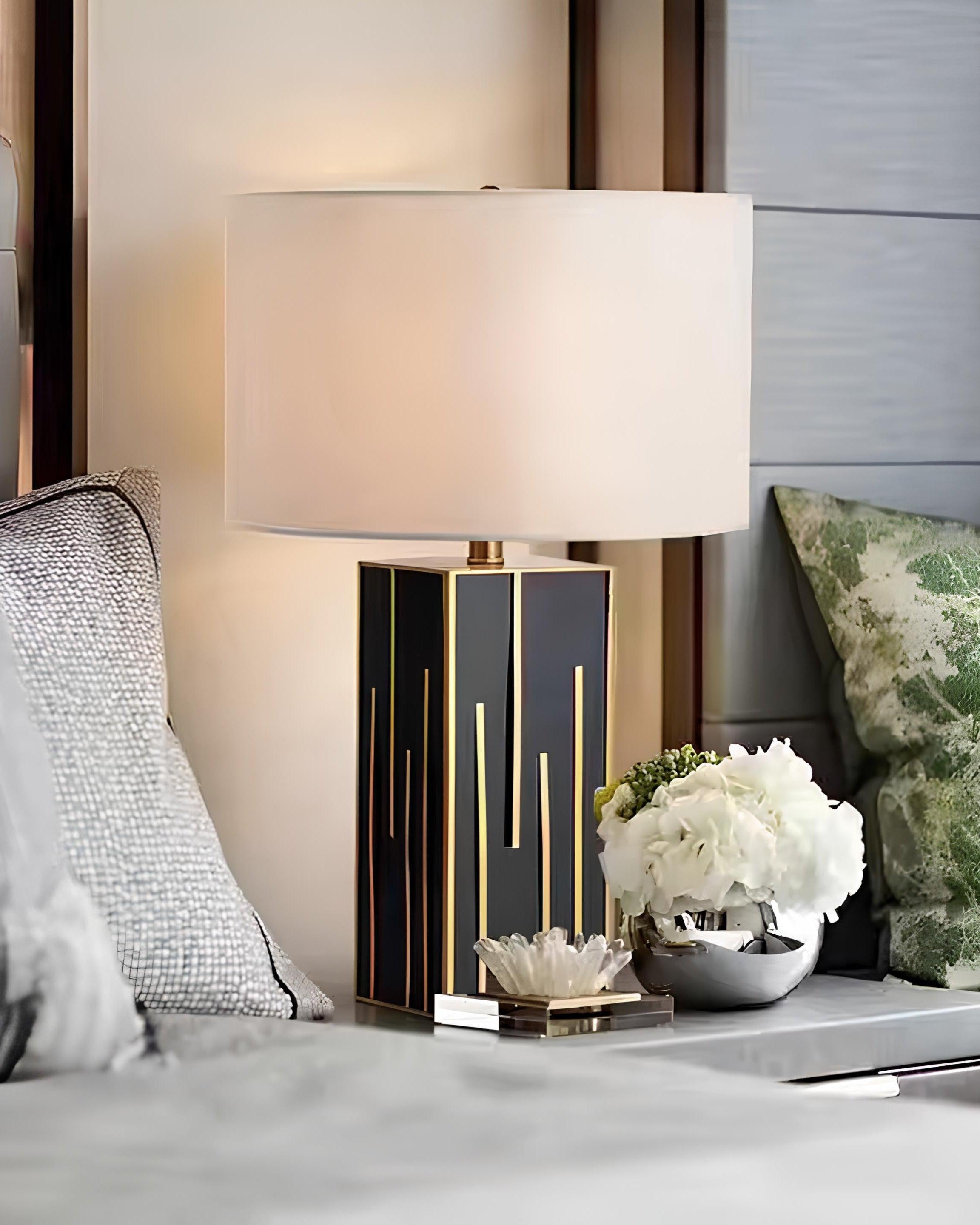 Modern gold table lamp with tall fabric shade for bedroom or office”